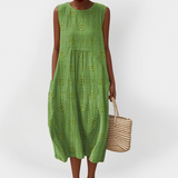 Elegante vestito estivo in cotone senza maniche con tasche