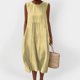 Elegante vestito estivo in cotone senza maniche con tasche